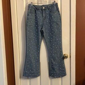 size large never worn brand new stunning blue jeans with pearls. Very well-made